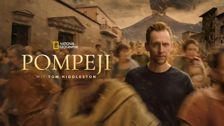 Plakat Pompeji mit Tom Hiddleston. Links ist der Titel zu sehen darüber ist das National Geographic Logo zu sehen. Hiddleston ist rechts vom Logo und trägt ein dunkles Hemd, um in herum sind Menschen aus Pompeji.