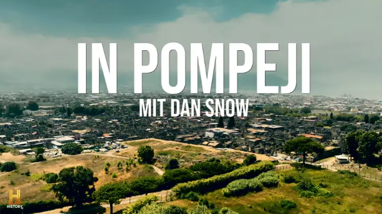 Plakat „In Pompeji mit Dan Snow“, der Titel ist zu sehen, im Hintergrund ist die Landschaft von Pompeji zu sehen.